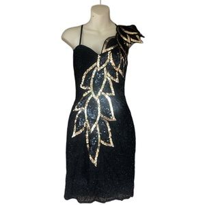 Only worn twice.  Cleaning out my closet.